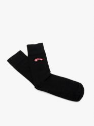 Świąteczne skarpety unisex. Czarne skarpetki Ryłko, bez wzorów, z bawełny. W wyprzedaży za 14.99 zł.