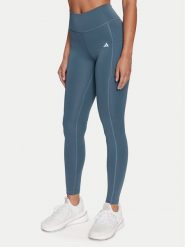 Adidas Legginsy Optime IT9110 Niebieski Slim Fit. Niebieskie legginsy adidas, bez wzorów, z syntetyku, sportowe. Za 279.99 zł.
