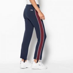 Damskie legginsy Fila FIA HUNTER TRACK PANTS 682339-170. Niebieskie legginsy Fila, bez wzorów, z bawełny, eleganckie. Za 162.36 zł.