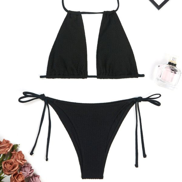 Dwuczęściowy strój kąpielowy z regulowanym topem na plażę lub basen Maribel. Białe bikini Intica, bez wzorów, z materiału. Za 139.00 zł.