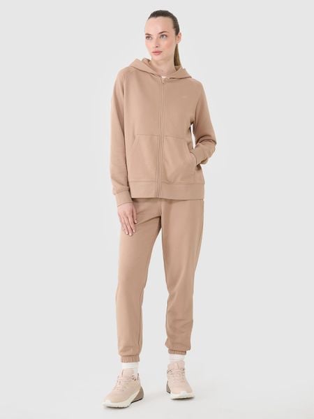 4F Spodnie dresowe joggery damskie - beżowe XXL. Brązowe spodnie dresowe 4f, bez wzorów, z bawełny. W wyprzedaży za 99.99 zł.