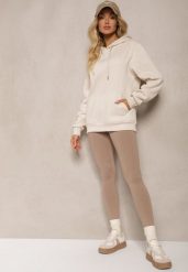 Beżowe Legginsy z Gumką w Talii z Długimi Nogawkami Caleta. Brązowe legginsy Renee, bez wzorów, z jeansu, klasyczne, długie. W wyprzedaży za 13.99 zł.