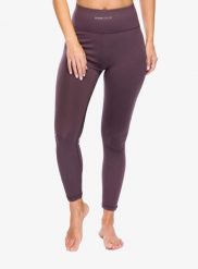 Legginsy damskie Super.natural High Rise Tight. Fioletowe legginsy super.natural, bez wzorów, z materiału. Za 284.89 zł.