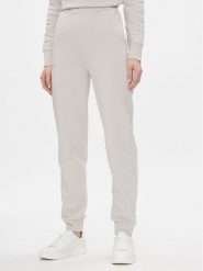 Calvin Klein Spodnie dresowe Metallic Micro Logo Jogger K20K206965 Beżowy Regular Fit. Brązowe spodnie dresowe Calvin Klein, bez wzorów, z bawełny. Za 279.99 zł.