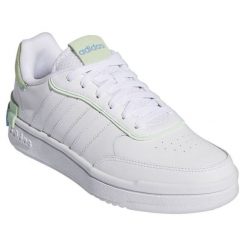 Buty adidas Postmove Se W IG3796 białe. Białe buty treningowe bez wzorów, z gumy, bez zapięcia. Za 361.11 zł.