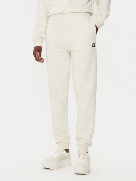 HUGO Spodnie dresowe Nelfinia 50522417 Beżowy Regular Fit. Brązowe spodnie dresowe Hugo, bez wzorów, z bawełny. Za 309.99 zł.