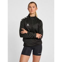 Damska bluza rozpinana 1/4 Hummel Core XK. Czarne bluzy Hummel, bez wzorów, sportowe, bez ramiączek, bez kaptura. Za 227.50 zł.