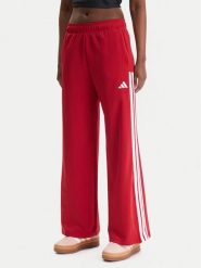 Adidas Spodnie dresowe House Of Tiro KD4298 Czerwony Wide Leg. Czerwone spodnie sportowe adidas, bez wzorów, z bawełny. Za 259.99 zł.
