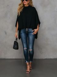 Milan Kiss Bluzka w kolorze czarnym rozmiar: L. Czarne bluzki Milan Kiss, l, bez wzorów, bez kołnierzyka, bez ramiączek. Za 130.99 zł.