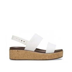 Sandały dla Kobiet Crocs Brooklyn Cork Low Wedge. Brązowe sandały Crocs, bez wzorów, z materiału, eleganckie, bez obcasa, na koturnie, bez zapięcia. Za 199.99 zł.