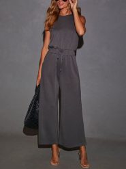 Milan Kiss Kombinezon w kolorze antracytowym rozmiar: S. Czarne kombinezony Milan Kiss, s, bez wzorów, bez kołnierzyka, bez ramiączek. Za 195.99 zł.