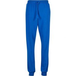 Spodnie dresowe dla kobiet Urban Classics Light Terry. Niebieskie spodnie sportowe Urban Classics, bez wzorów, z dresówki, długie. Za 175.50 zł.