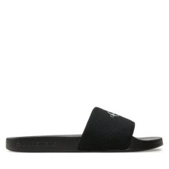 Klapki Calvin Klein Jeans. Czarne klapki Calvin Klein Jeans, bez wzorów, z jeansu, bez obcasa, bez zapięcia. Za 179.99 zł.