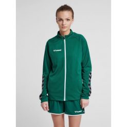 Kurtka damska Hummel Zip hmlAUTHENTIC Poly. Zielone kurtki Hummel, na wiosnę, xs, bez wzorów, z dzianiny, klasyczne, bez kaptura. Za 204.00 zł.