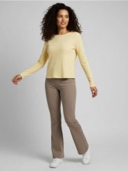 Bawełniana prążkowana bluzka z długim rękawem - żółty. Żółte bluzki Sinsay, l, bez wzorów, z bawełny, bez kołnierzyka, bez ramiączek. Za 29.99 zł.