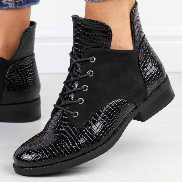Czarne płaskie botki damskie Vinceza 16524. Czarne botki VINCEZA, bez wzorów, z lakierowanej skóry, eleganckie, bez obcasa, na obcasie, bez zapięcia. Za 199.00 zł.