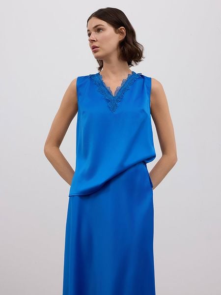 BGN Top w kolorze niebieskim rozmiar: 38. Niebieskie topy BGN, bez wzorów, bez kołnierzyka, bez ramiączek. Za 74.28 zł.