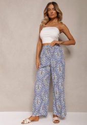 Niebieskie Boho Spodnie z Wiskozy High Waist z Szerokimi Nogawkami i Gumką w Pasie Walnena. Niebieskie jeansy Renee, bez wzorów, z jeansu, boho, z podwyższonym stanem. W wyprzedaży za 29.99 zł.