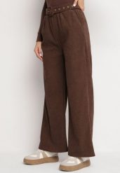 Brązowe Szerokie Sztruksowe Spodnie z Wysokim Stanem i Materiałowy Paskiem Omerin. Brązowe jeansy Born2be, l, bez wzorów, z jeansu, eleganckie, z podwyższonym stanem. W wyprzedaży za 42.49 zł.