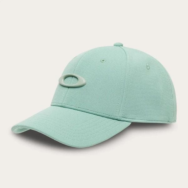 Czapka Oakley TINCAN. Brązowe czapki z daszkiem Oakley, na lato, bez wzorów, z elastanu, eleganckie. Za 112.58 zł.