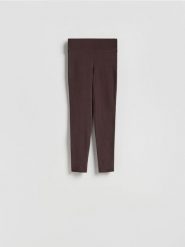 Bawełniane legginsy - ciemnobrązowy. Brązowe legginsy Reserved, bez wzorów, z bawełny. Za 49.99 zł.
