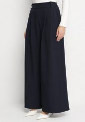 Granatowe Spodnie o Fasonie Palazzo z Wsuwanymi Kieszeniami Adivena. Niebieskie jeansy Born2be, bez wzorów, z jeansu, eleganckie, z podwyższonym stanem, długie. Za 99.99 zł.