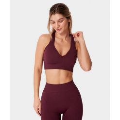 Biustonosz bezszwowy Carpatree Elite fioletowy. Fioletowe biustonosze sportowe Carpatree, bez wzorów, na jogę i pilates. Za 159.99 zł.