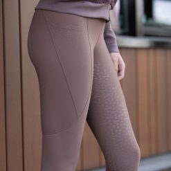 Damskie legginsy jeździeckie z pełną przyczepnością Harry's Horse Classy. Brązowe legginsy HARRYS HORSE, z aplikacjami, z elastanu, eleganckie, długie. Za 292.50 zł.