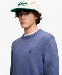 Superdry Sweter Preppy z bawełny – relaxed fit. Niebieskie swetry Superdry, s, z aplikacjami, z bawełny, klasyczne, bez ramiączek. Za 330.60 zł.