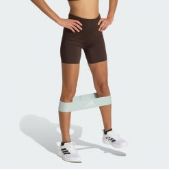 Legginsy Workout Essentials Scrunch z dzianiny o długości wewnętrznej strony. Brązowe legginsy adidas, bez wzorów, z dzianiny, sportowe. Za 149.00 zł.