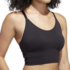 Biustonosz sportowy damski Adidas Seamless. Czarne biustonosze sportowe adidas, bez wzorów, na fitness i siłownię. Za 114.00 zł.