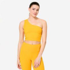 Koszulka fitness damska Domyos bez rękawów. Żółte t-shirty sportowe DOMYOS, xl, bez wzorów, z materiału, bez ramiączek, na fitness i siłownię. Za 64.99 zł.
