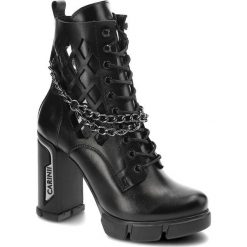 Czarne Botki Carinii Eleganckie Skórzane Buty Damskie. Czarne botki Carinii, bez wzorów, ze skóry, eleganckie, bez obcasa, na słupku, bez zapięcia. Za 539.00 zł.