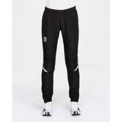 Spodnie narciarskie dla kobiet Daehlie Sportswear Winner 4.0. Czarne spodnie narciarskie DAEHLIE, bez wzorów, z materiału, narciarskie. Za 545.00 zł.