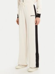 Guess Spodnie dresowe V5RB00 KCO72 Écru Regular Fit. Spodnie dresowe Guess, z aplikacjami, z dresówki. Za 229.99 zł.
