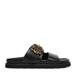 Klapki GINO ROSSI. Czarne klapki Gino Rossi, bez wzorów, bez obcasa, bez zapięcia. Za 329.99 zł.