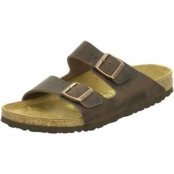 Klapki Birkenstock Arizona. Brązowe klapki Birkenstock, bez wzorów, z jeansu, eleganckie, bez obcasa, bez zapięcia. Za 526.25 zł.