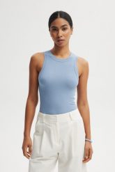 TOP GWEN BŁĘKITNY S - Flawless. Niebieskie topy sportowe Flawless, s, bez wzorów, z bawełny. Za 259.00 zł.