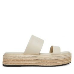 Klapki Calvin Klein. Białe klapki Calvin Klein, bez wzorów, bez obcasa, bez zapięcia. Za 299.99 zł.