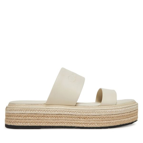 Klapki Calvin Klein. Białe klapki Calvin Klein, bez wzorów, bez obcasa, bez zapięcia. Za 299.99 zł.