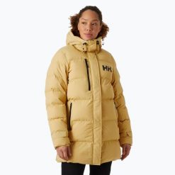 Płaszcz puchowy damski Helly Hansen Adore Puffy Parka. Brązowe płaszcze Helly Hansen, na zimę, bez wzorów, z puchu, bez kaptura. W wyprzedaży za 986.35 zł.