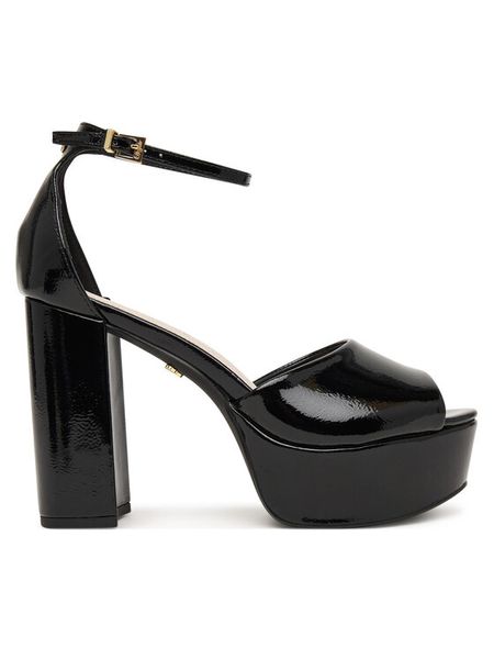 Buffalo Sandały Jessie Neat 1291668 Czarny. Czarne sandały Buffalo, bez wzorów, ze skóry, bez obcasa, na słupku, bez zapięcia. Za 349.99 zł.