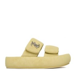 Klapki Juicy Couture. Żółte klapki Juicy Couture, bez wzorów, bez obcasa, bez zapięcia. Za 249.99 zł.