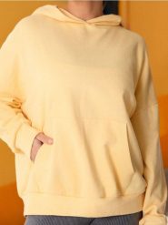 Bluza hoodie z kieszenią - żółty. Żółte bluzy Sinsay, l, bez wzorów, z dzianiny, bez ramiączek, bez kaptura. Za 25.99 zł.
