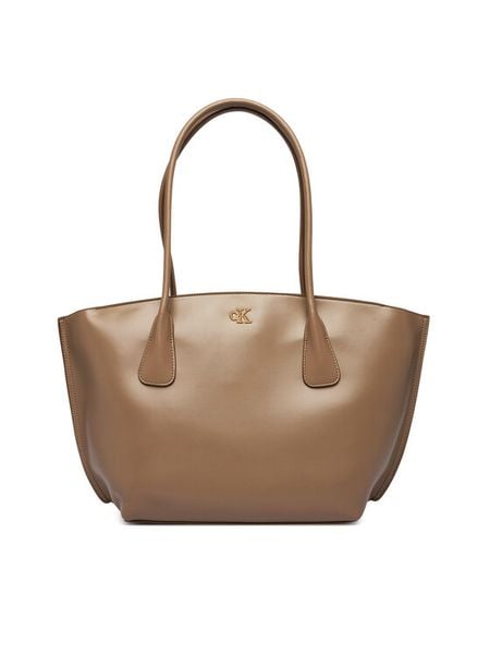 Calvin Klein Torebka Ck Medium Dome Tot LV04F3344G Beżowy. Brązowe shopper bag Calvin Klein, bez wzorów, ze skóry, bez dodatków. Za 649.99 zł.