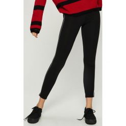 Legginsy z lampasami - Czarny. Legginsy marki Nike. Za 29.99 zł.