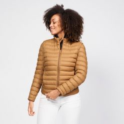 Kurtka do golfa damska Inesis CW900 Heatflex ciepła. Niebieskie kurtki INESIS, na zimę, m, bez wzorów, z materiału, sportowe, bez kaptura. W wyprzedaży za 139.99 zł.