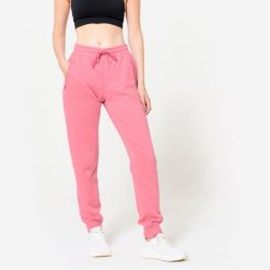 Spodnie dresowe damskie Domyos Gym & Pilates. Czerwone spodnie dresowe DOMYOS, bez wzorów, z dresówki. Za 109.99 zł.