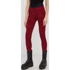 MICHAEL Michael Kors legginsy MU230BS6FR damskie kolor czerwony wzorzyste. Czerwone legginsy MICHAEL Michael Kors, bez wzorów, z dzianiny. W wyprzedaży za 284.99 zł.