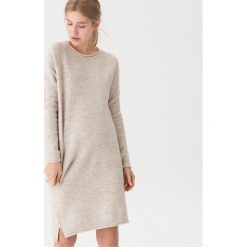 Długi sweter - Kremowy. Swetry marki INESIS. W wyprzedaży za 59.99 zł.